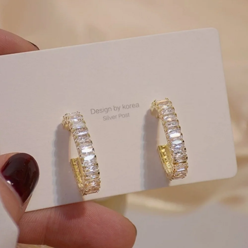 14K GOLD TEMPERAMENT WITH AAA ZIRCON STUD EARRINGS